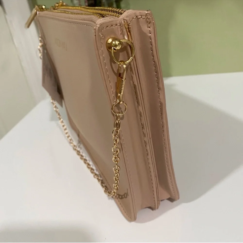Authentic Jason Wu cosmetic beauty pouch converted to a crossbody bag